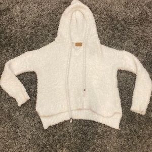 white fluffy sweater